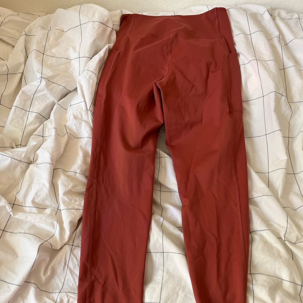 Girlfriend Collective high rise pocket leggings in Terra Medium
